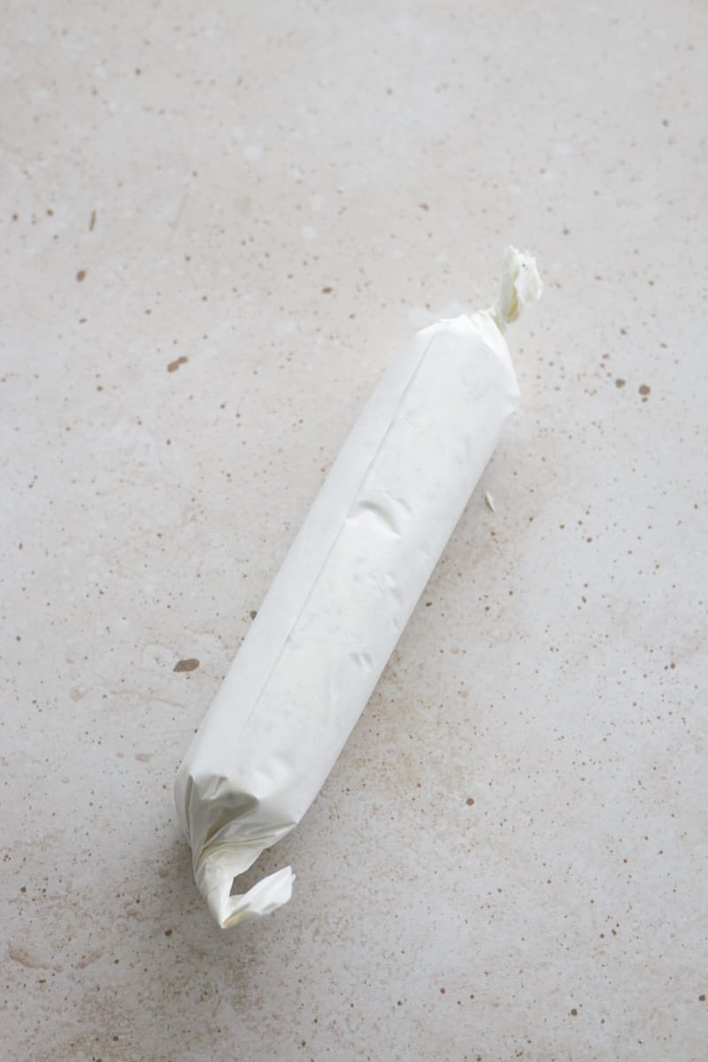 Butter rolled into a parchment paper log.