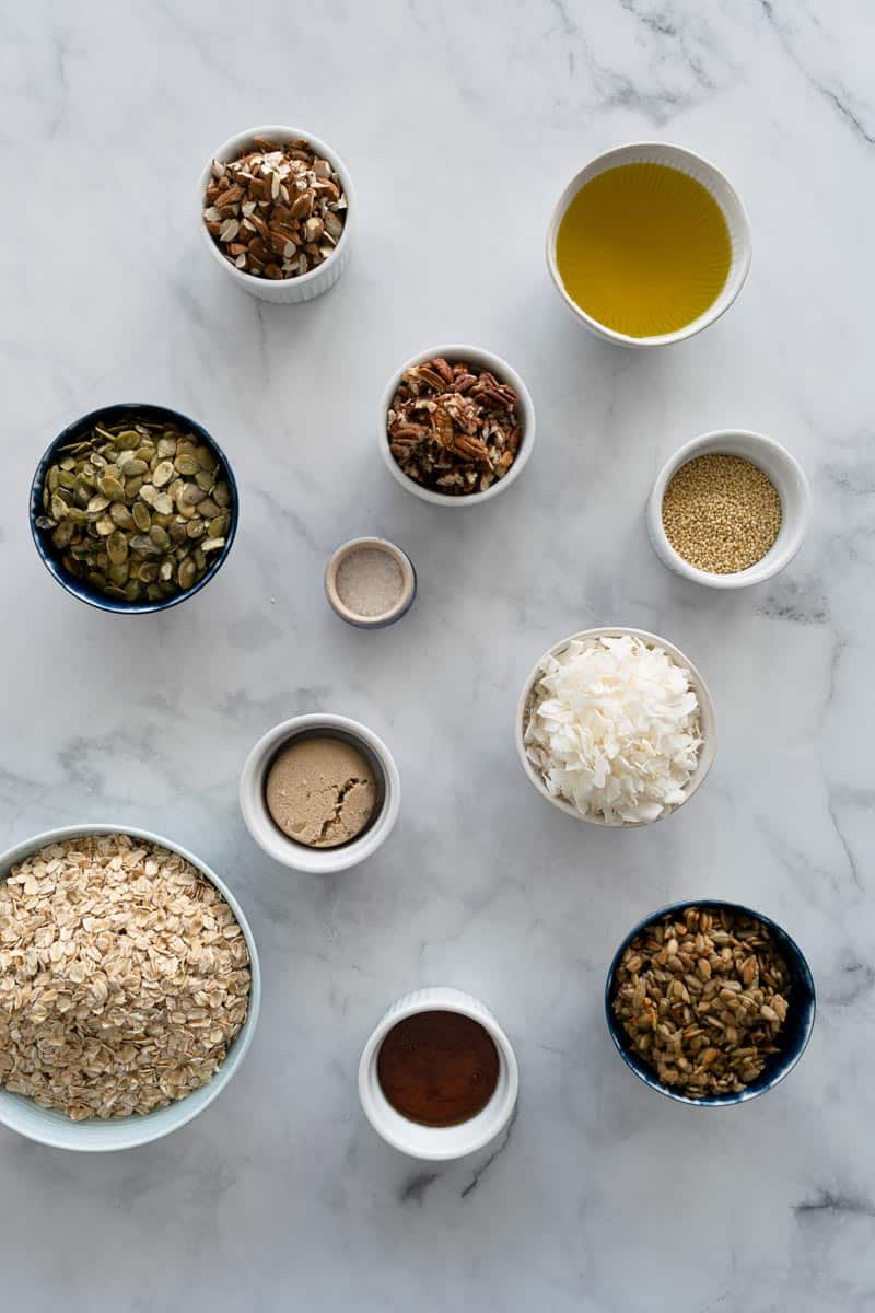 Ingredients for Coconut Almond Granola on small bowls. 