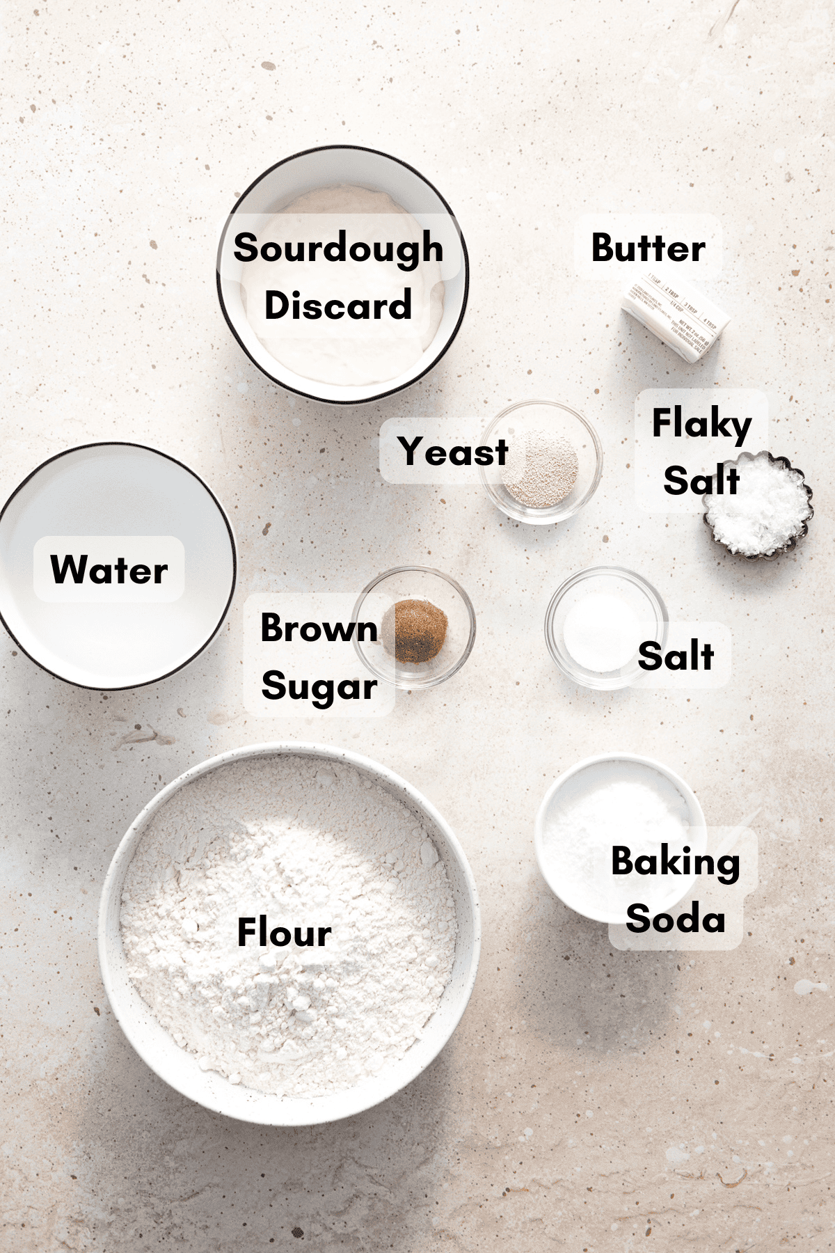 Ingredients for Sourdough Discard Pretzels in small bowls.