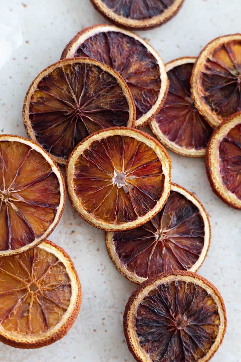 Dried blood oranges in a pile.