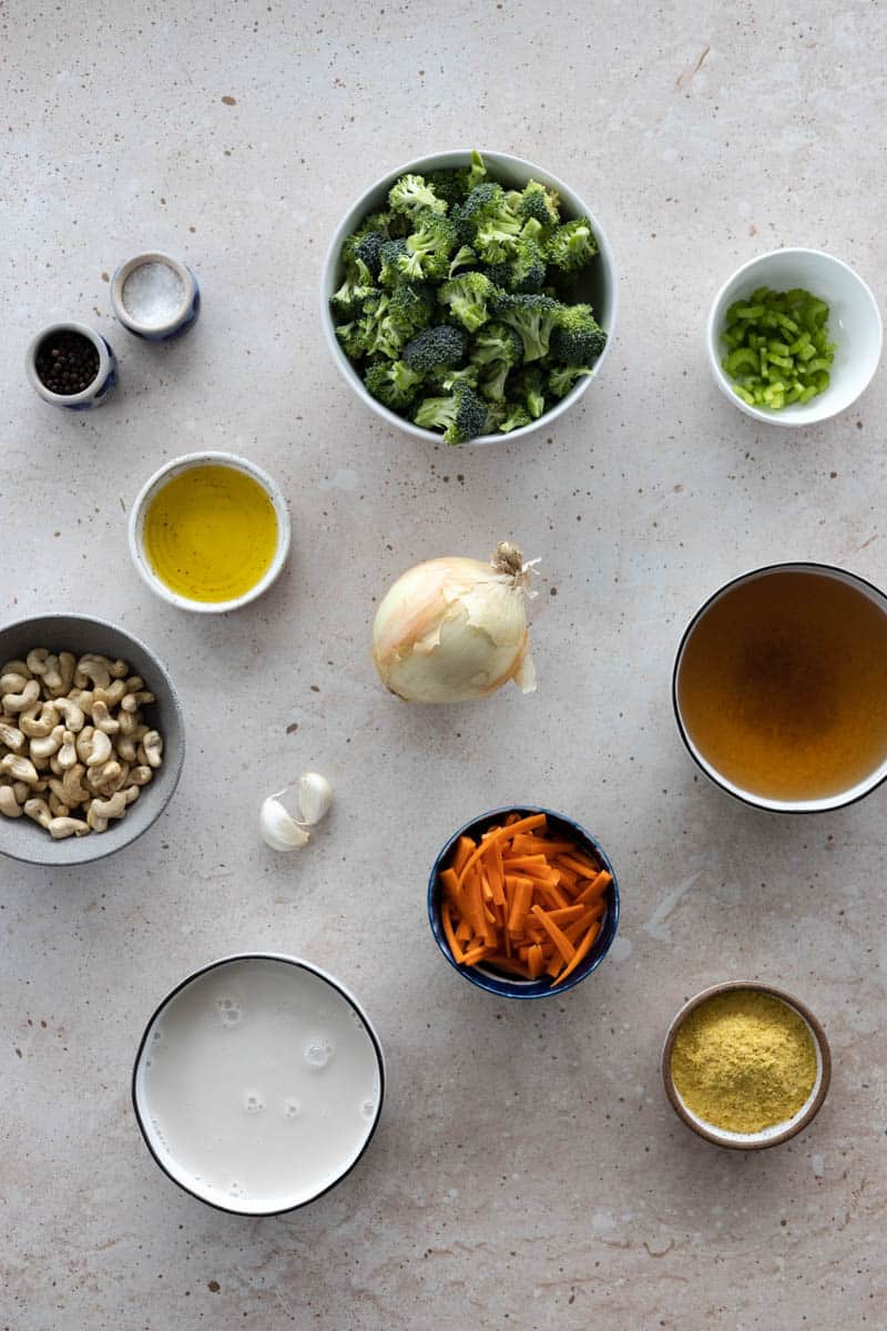 Ingredients for Dairy-Free Broccoli Soup in small bowls. 