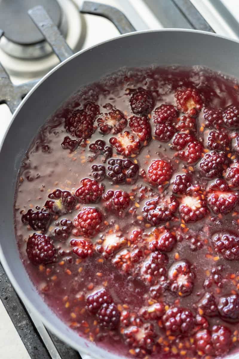 Simple syrup gently boiling in the skillet. 