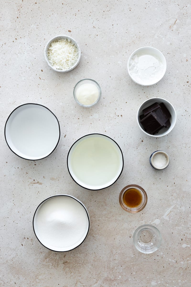 Ingredients for homemade marshmallows in small bowls. 