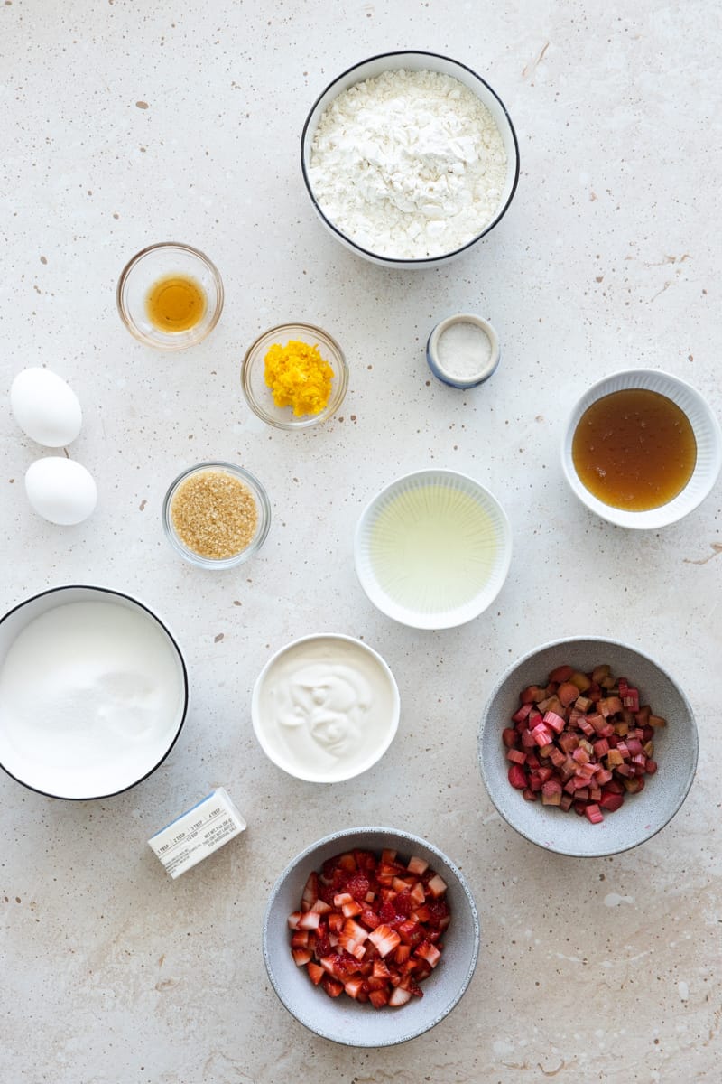 Ingredients for Strawberry Rhubarb Muffins in small bowls. 