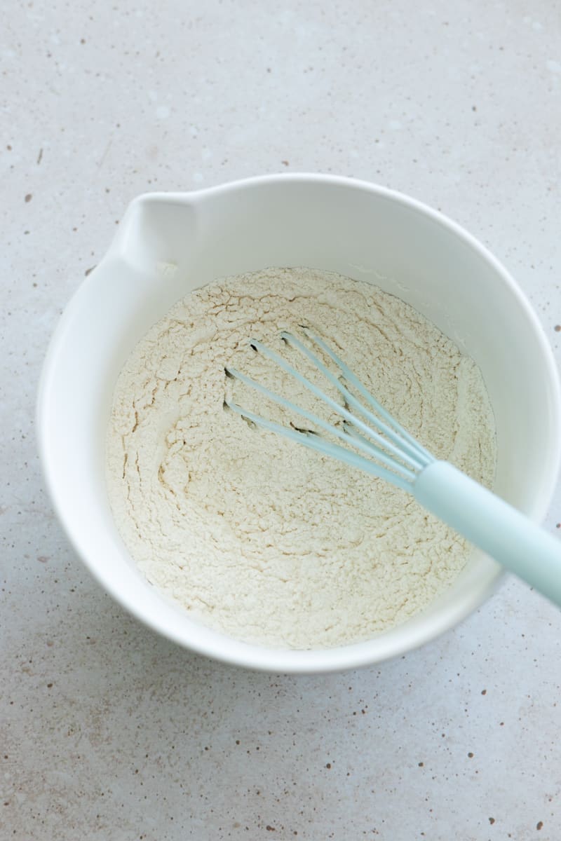 Dry ingredients whisked together in a bowl. 