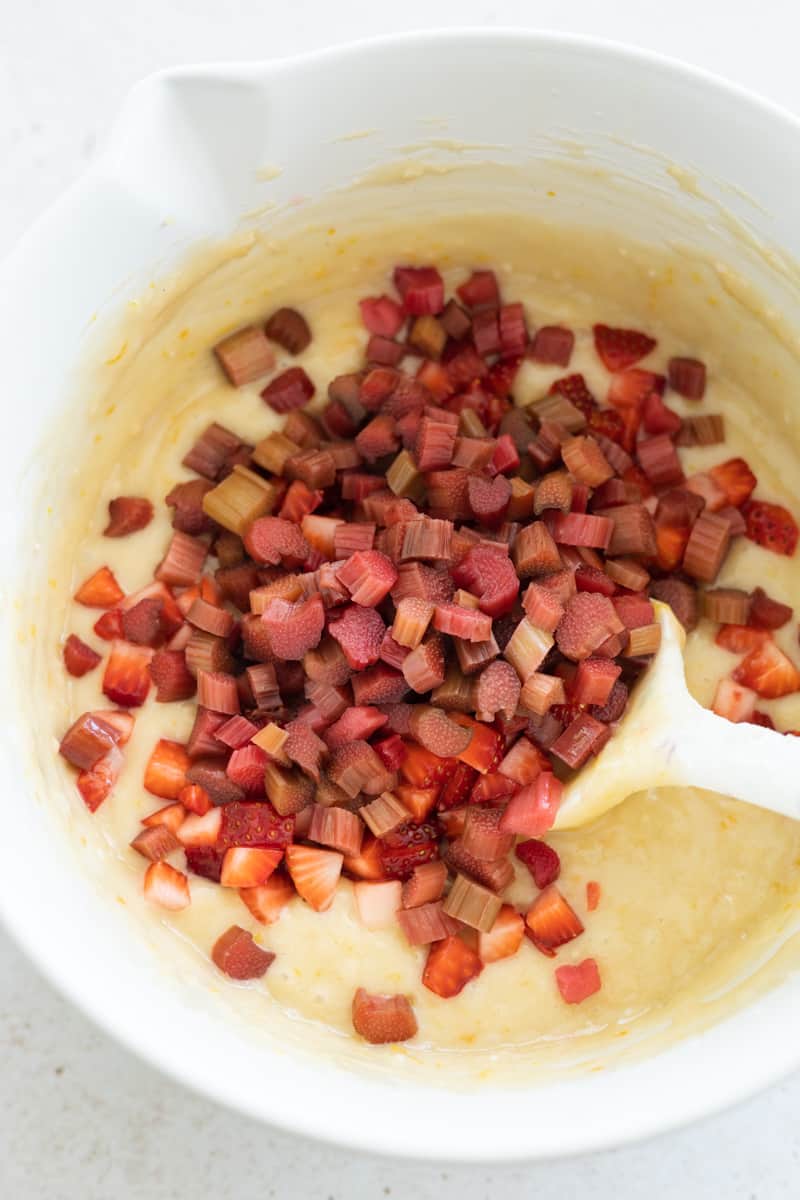 Strawberries and rhubarb added to the batter for mixing.