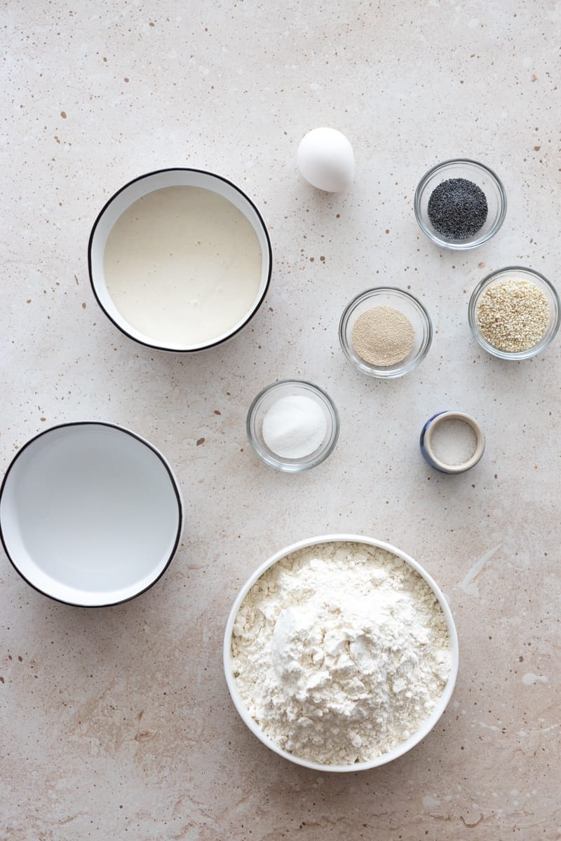 Ingredients for Sourdough Discard Bagels in small bowls. 