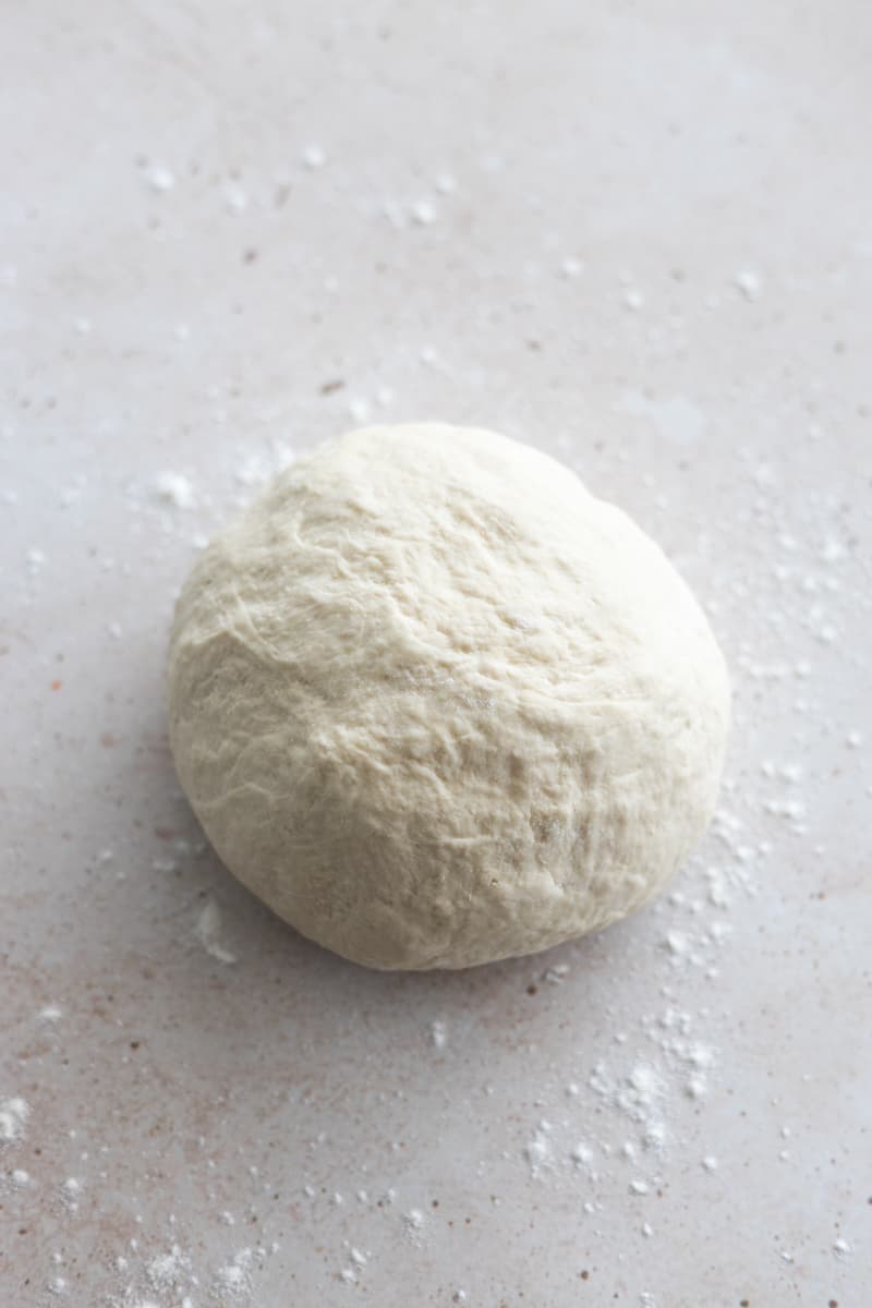 Dough in a ball after the first rise. 