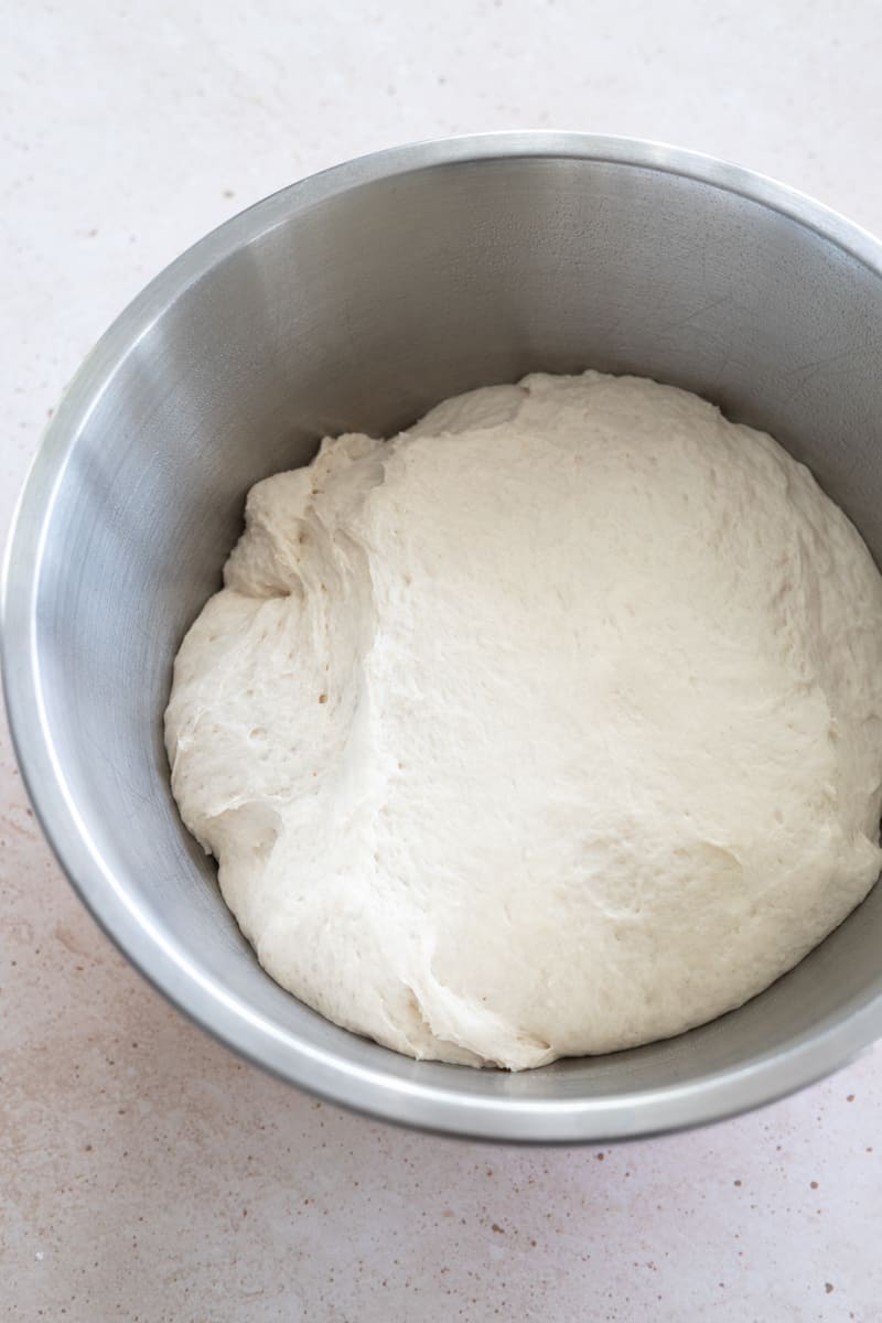 Dough rising in a bowl.
