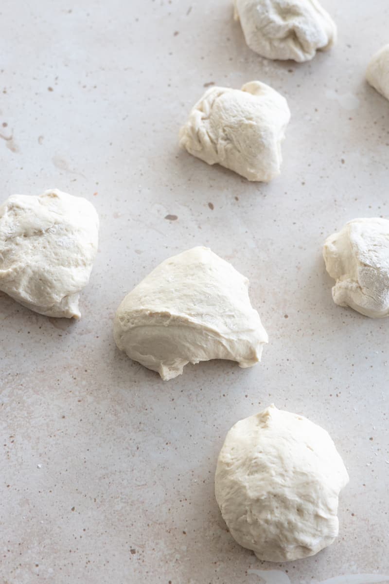 Dough divided into 8 equal pieces.