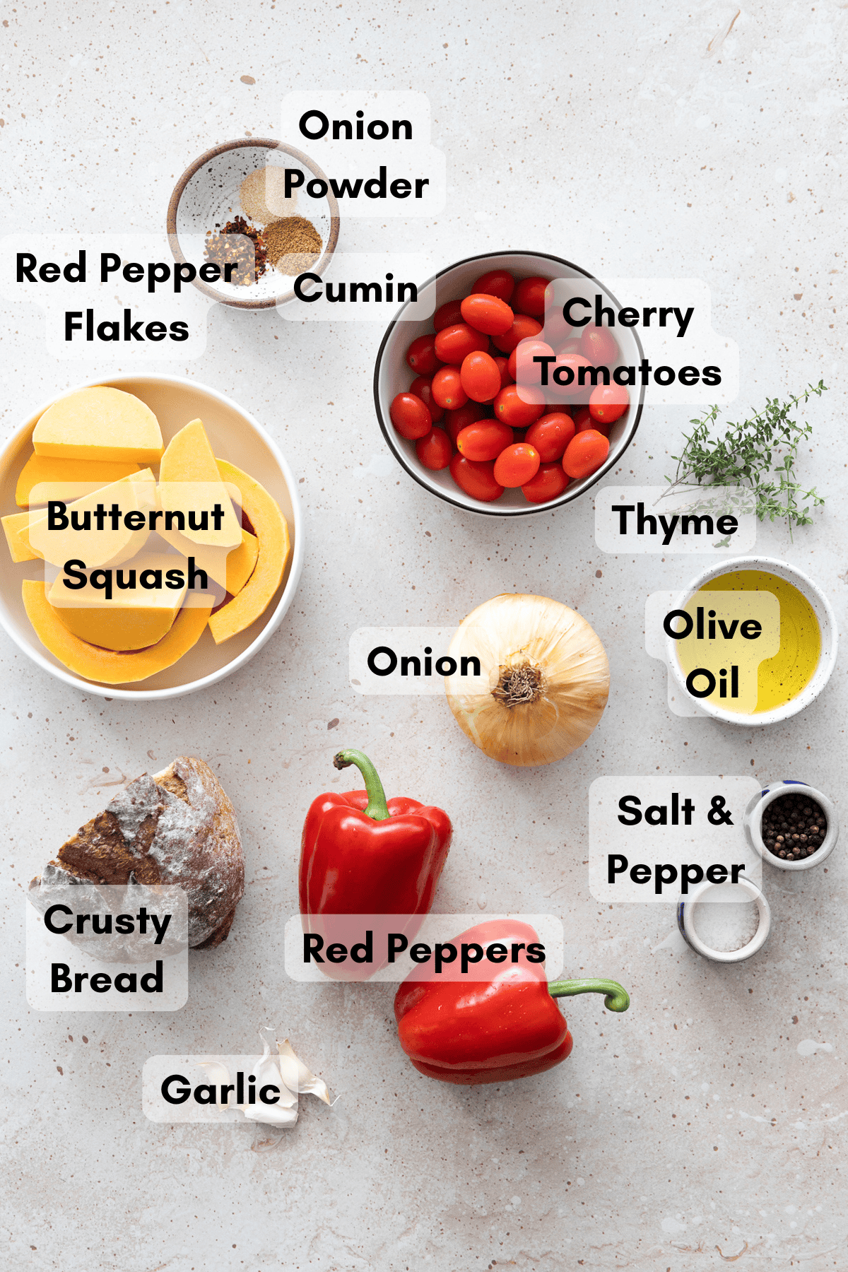Ingredients for Butternut Squash and Roasted Red Pepper Soup in small bowls.