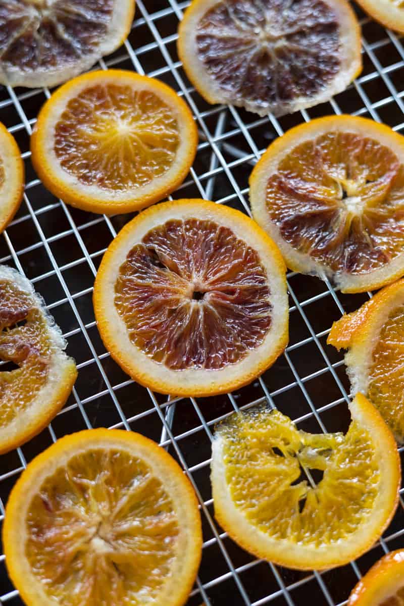 Oranges drying on a cooling rack. 
