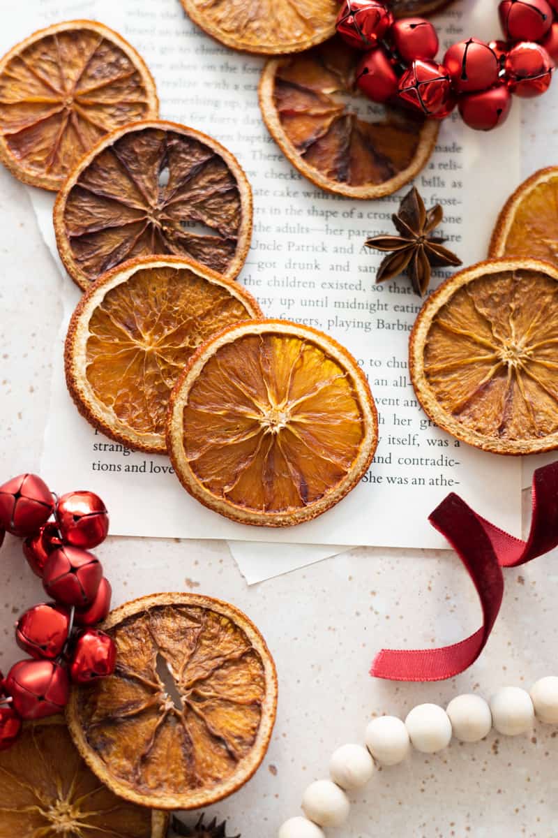 Dried Sliced Oranges with holiday accessories.