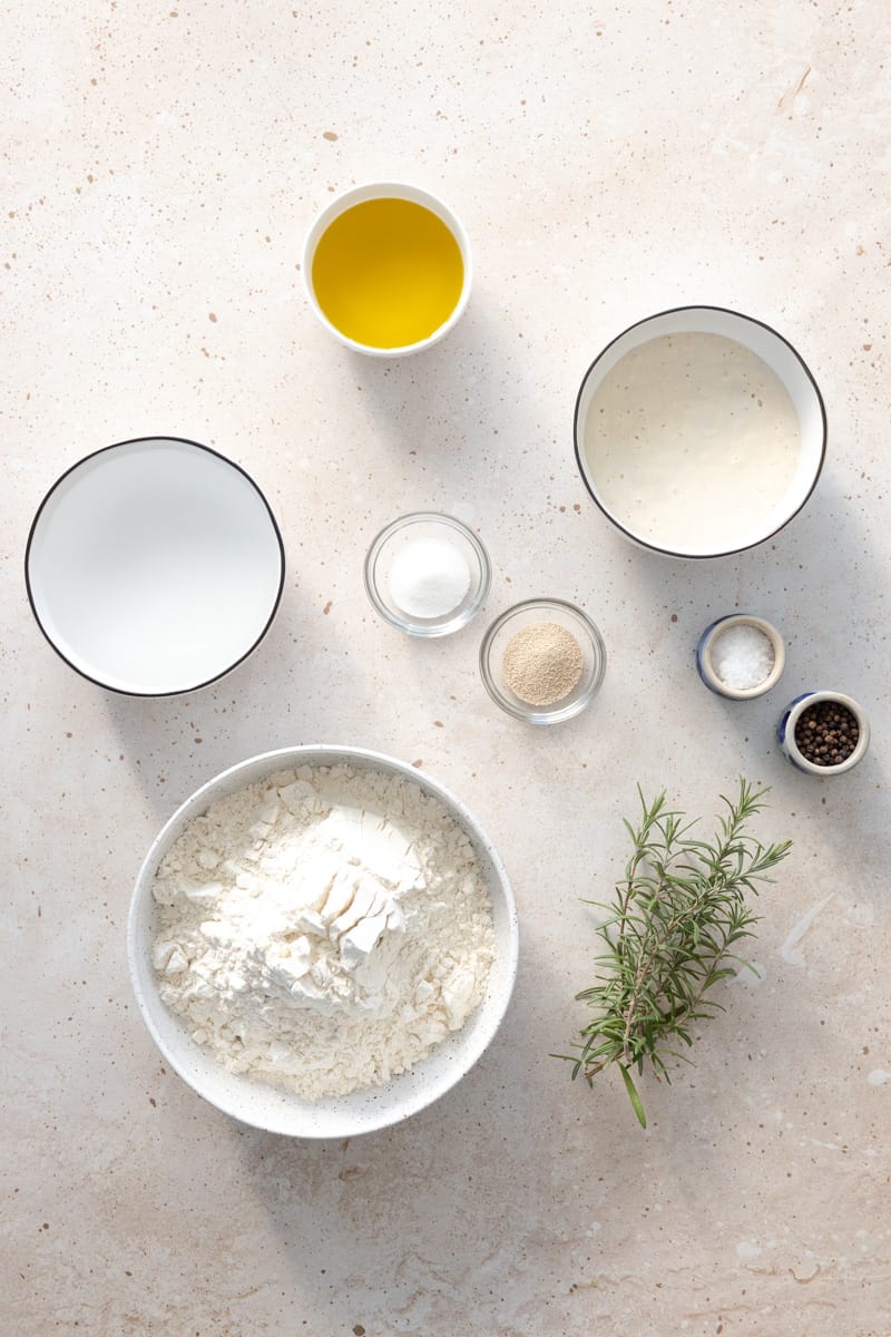 Ingredients for Rosemary Sourdough Focaccia in small bowls. 