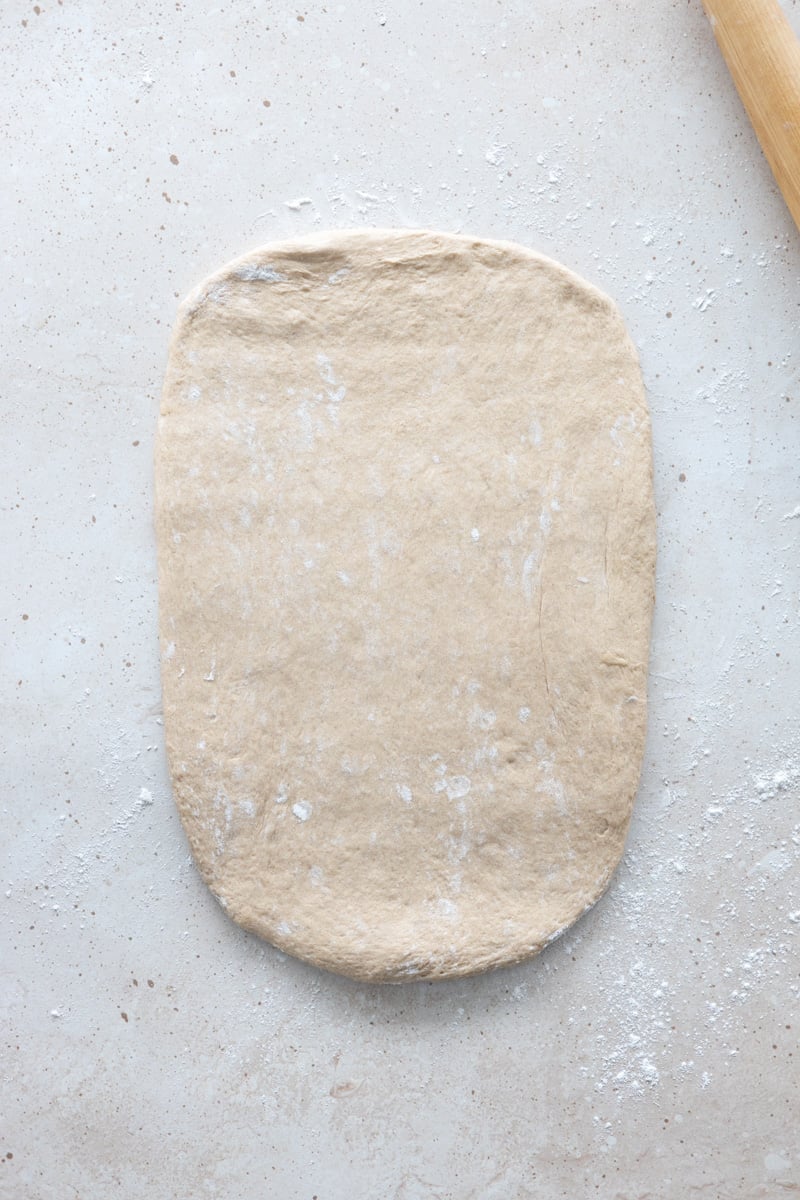 Dough rolled into a rectangle. 