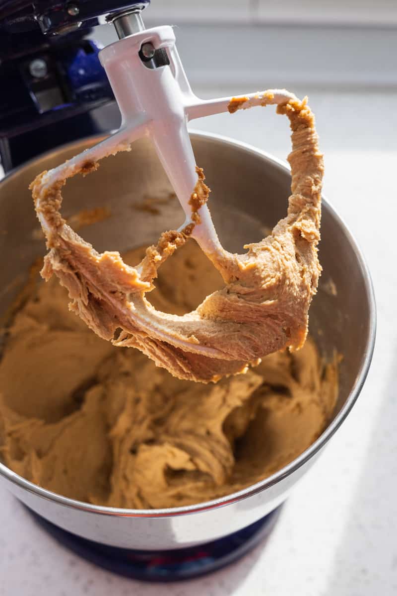 Smooth batter in the bowl of a stand mixer. 
