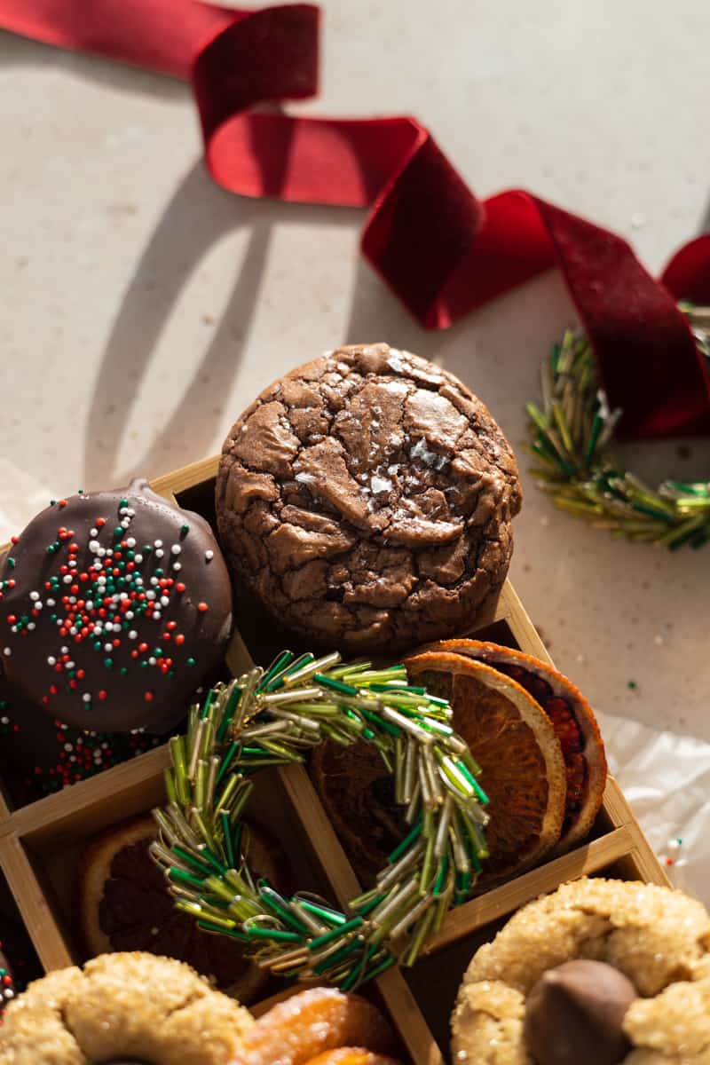 A closeup of the Chocolate Espresso Cookies in the holiday cookie box. 