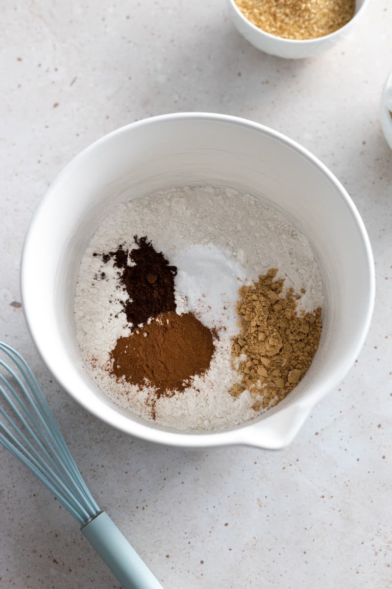 A mixing bowl with the dry ingredients. 