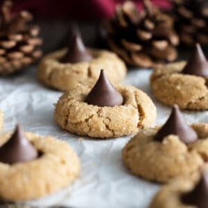 Peanut Kisses on a parchment paper.