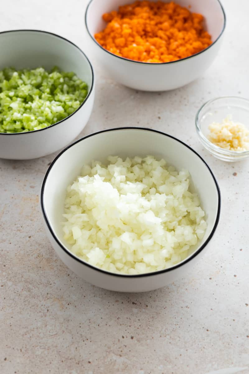 Chopped veggies in small bowls. 