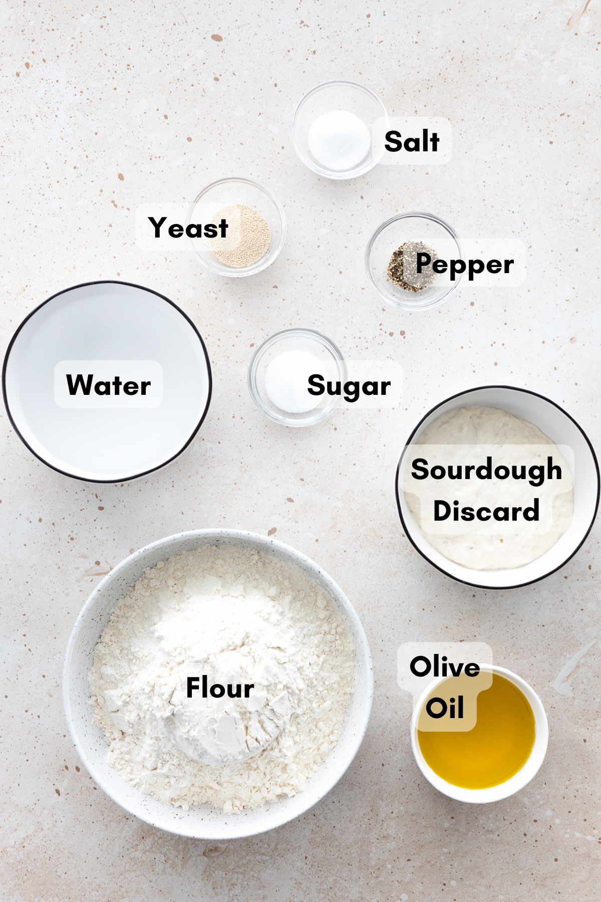 Ingredients for Sourdough Discard Focaccia in small bowls. 