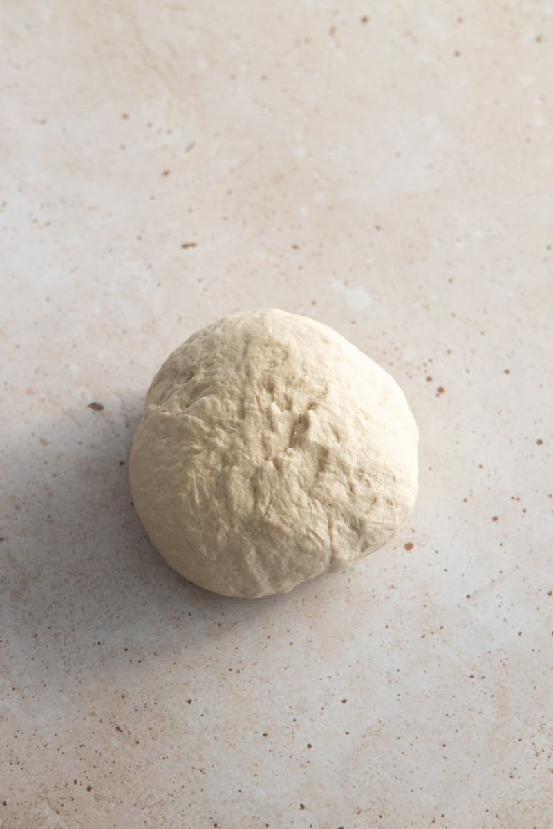 Dough ball on a work surface. 