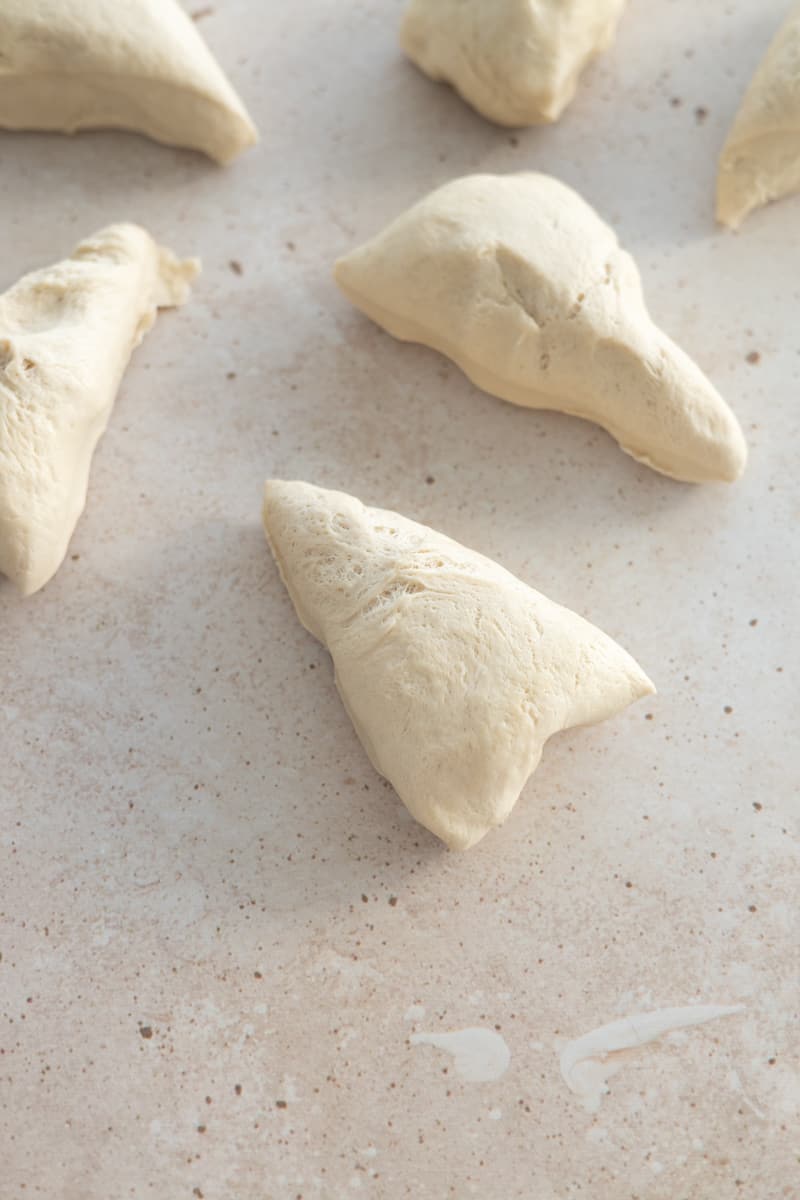 Dough divided into 8 triangles.