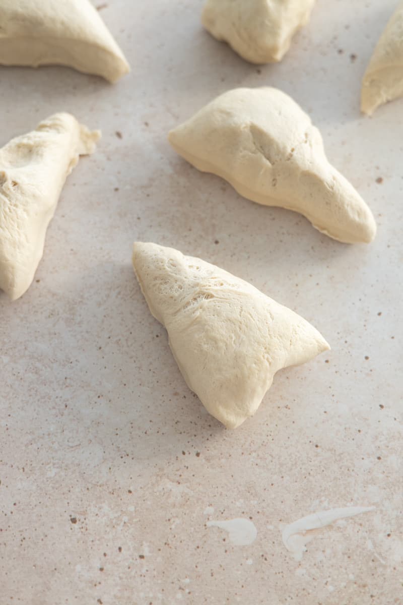 Dough divided into 8 triangles. 