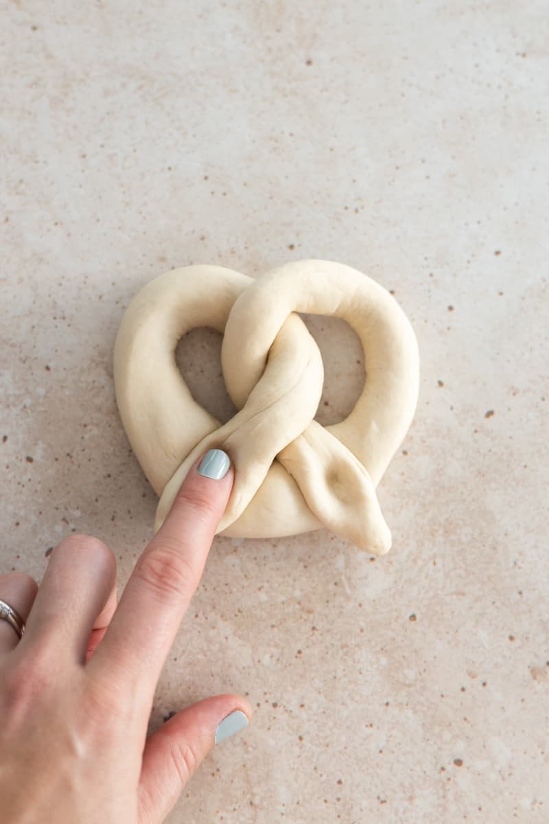 Dough folded into a pretzel shape.