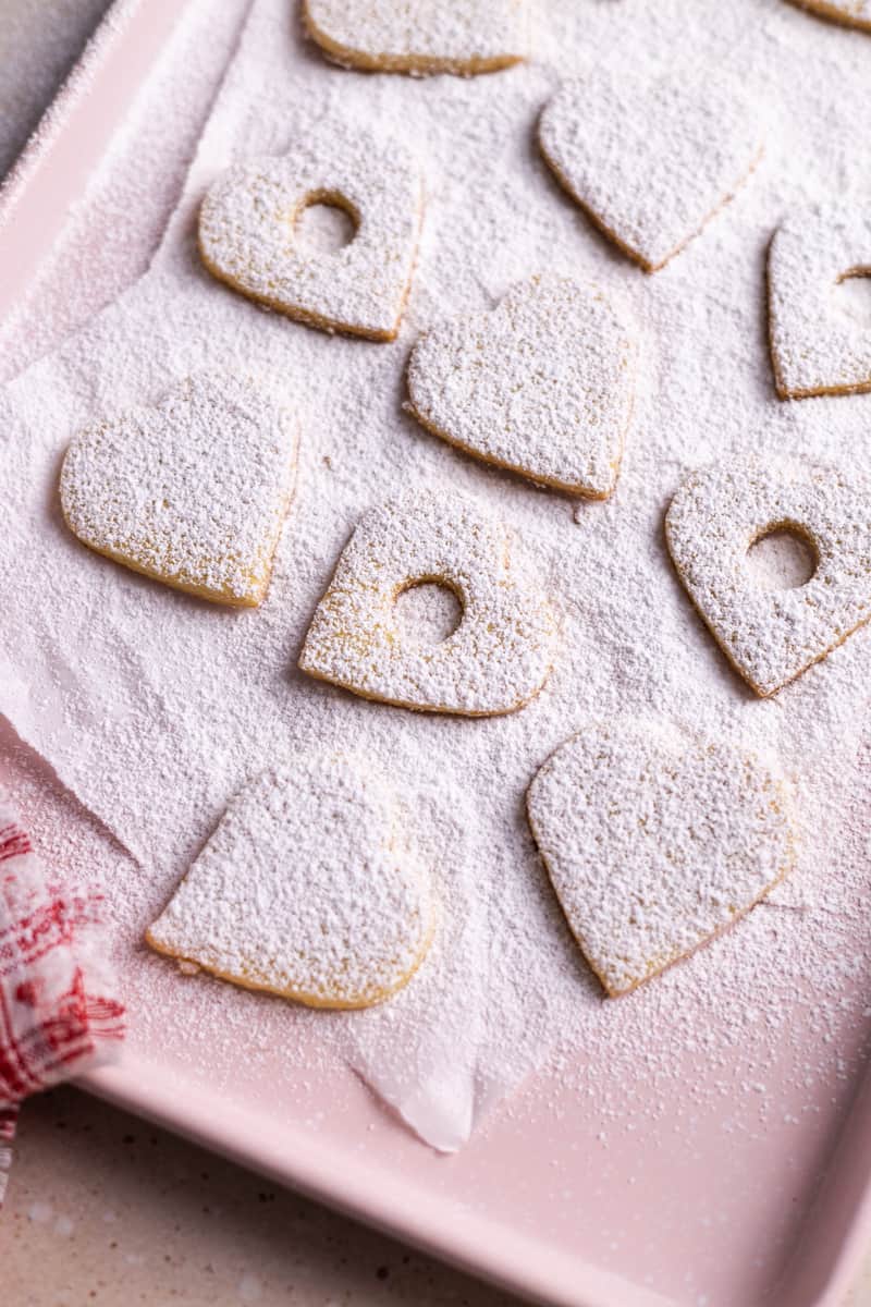 Cookies dusted with powdered sugar.