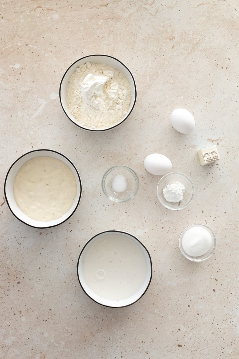 Ingredients for sourdough discard pancakes in small bowls.