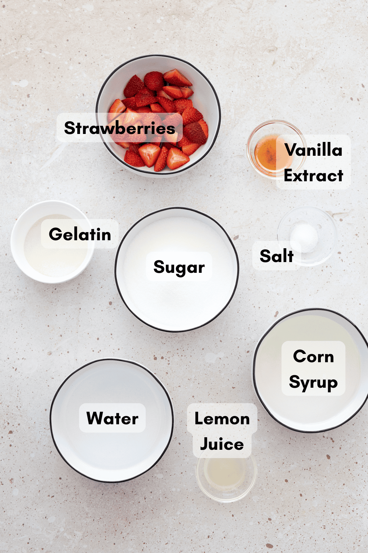 Ingredients for Strawberry Pink Marshmallows in small bowls. 