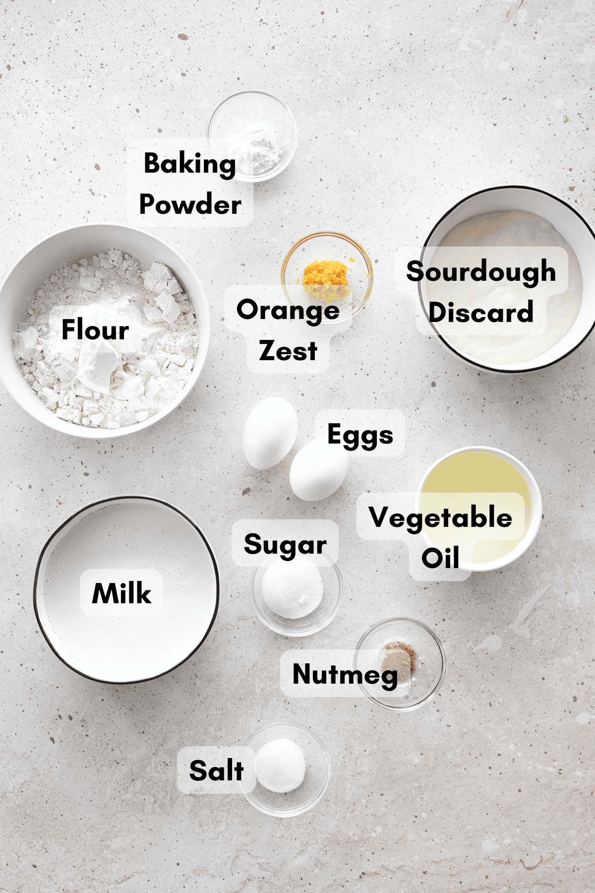 Ingredients for Sourdough Discard Waffles in small bowls. 