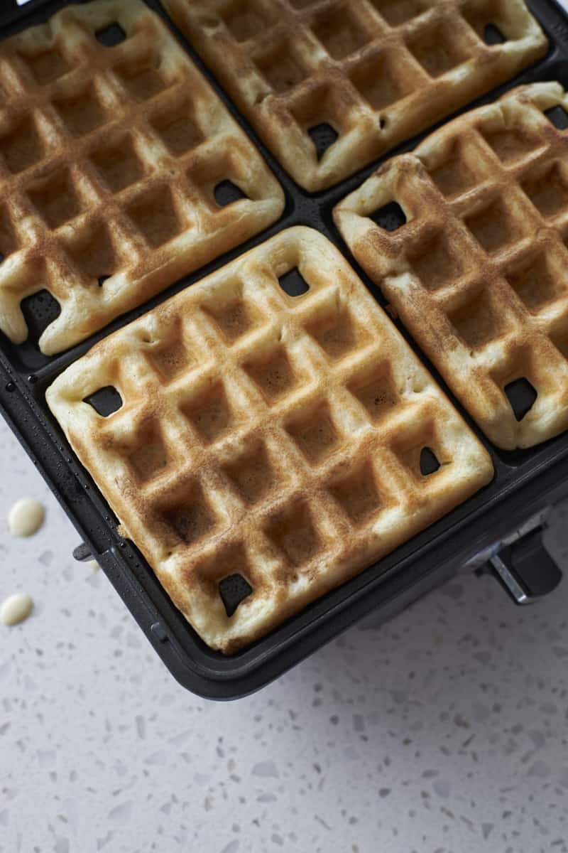 Sourdough Discard Waffles on a waffle iron.
