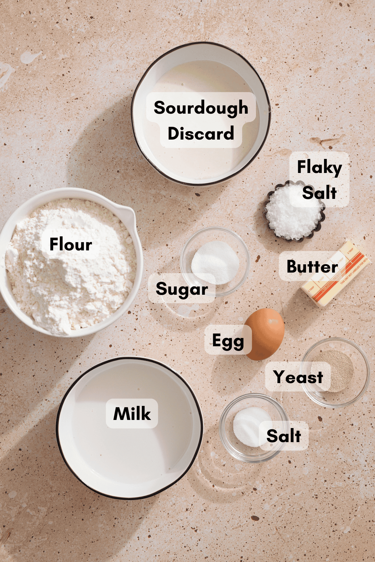 Ingredients for Sourdough Discard Rolls in small bowls. 