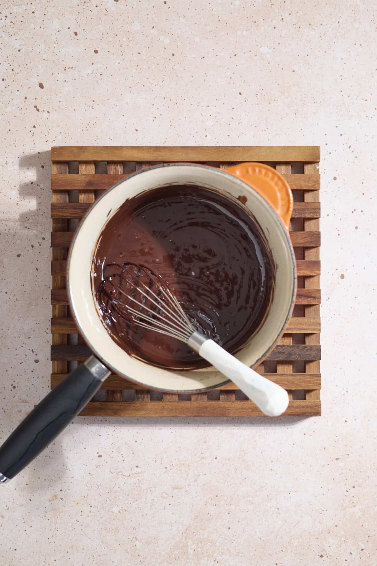 Butter and chocolate mixture in a saucepan.