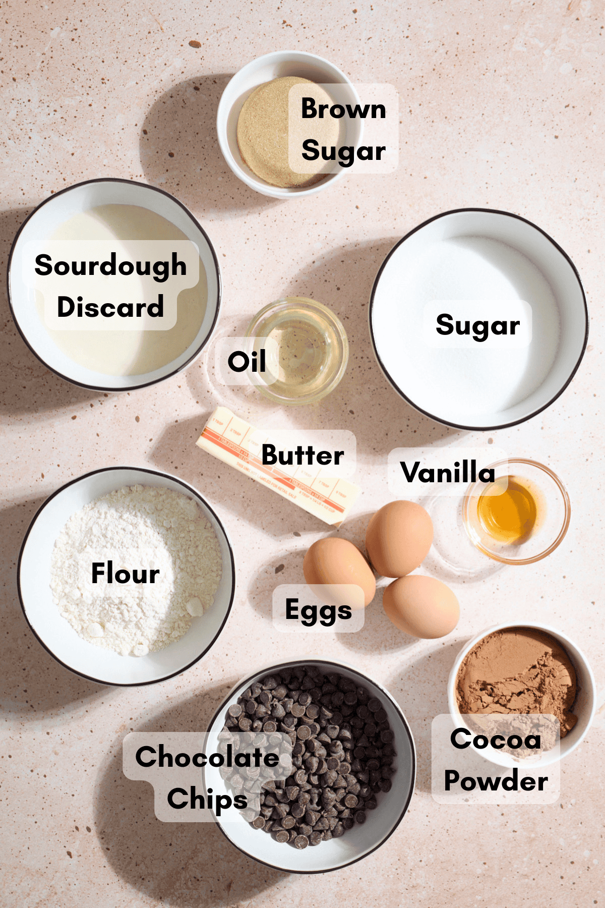 Ingredients for Sourdough Discard Brownies in small bowls.