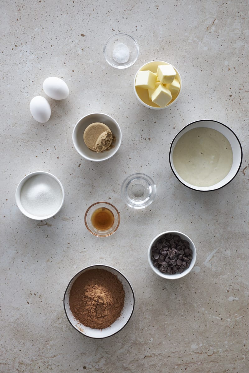 Ingredients for sourdough discard brownies in small bowls.