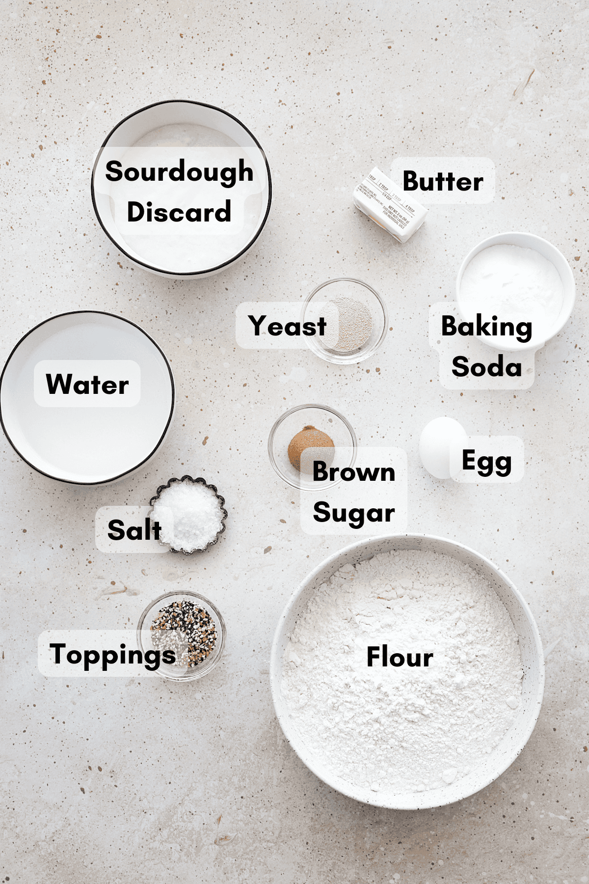 Ingredients for Sourdough Discard Pretzel Bites in small bowls. 