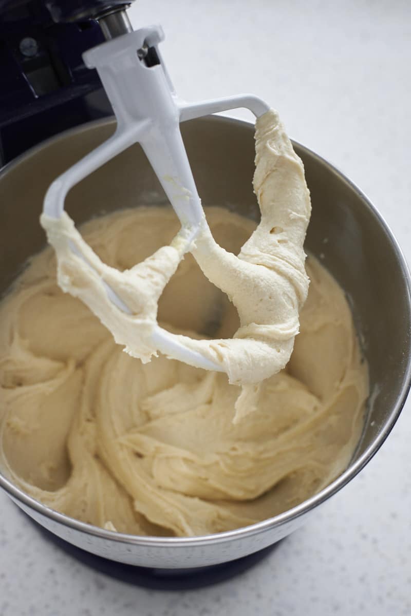 Smooth batter in the bowl of a stand mixer.