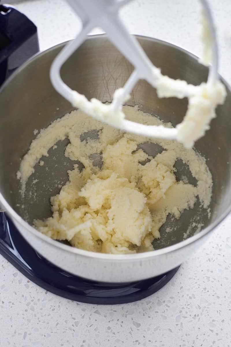 Creamed butter and sugar in the bowl of a stand mixer.