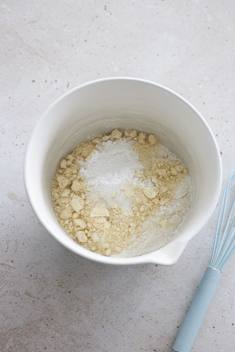 Dry ingredients in a white mixing bowl.