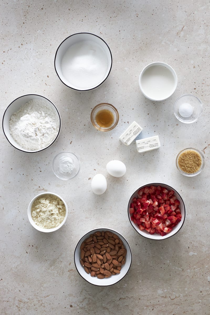 Ingredients for Strawberry Almond Muffins in small bowls.