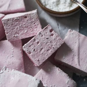 A sideview of two Blackberry Marshmallows.