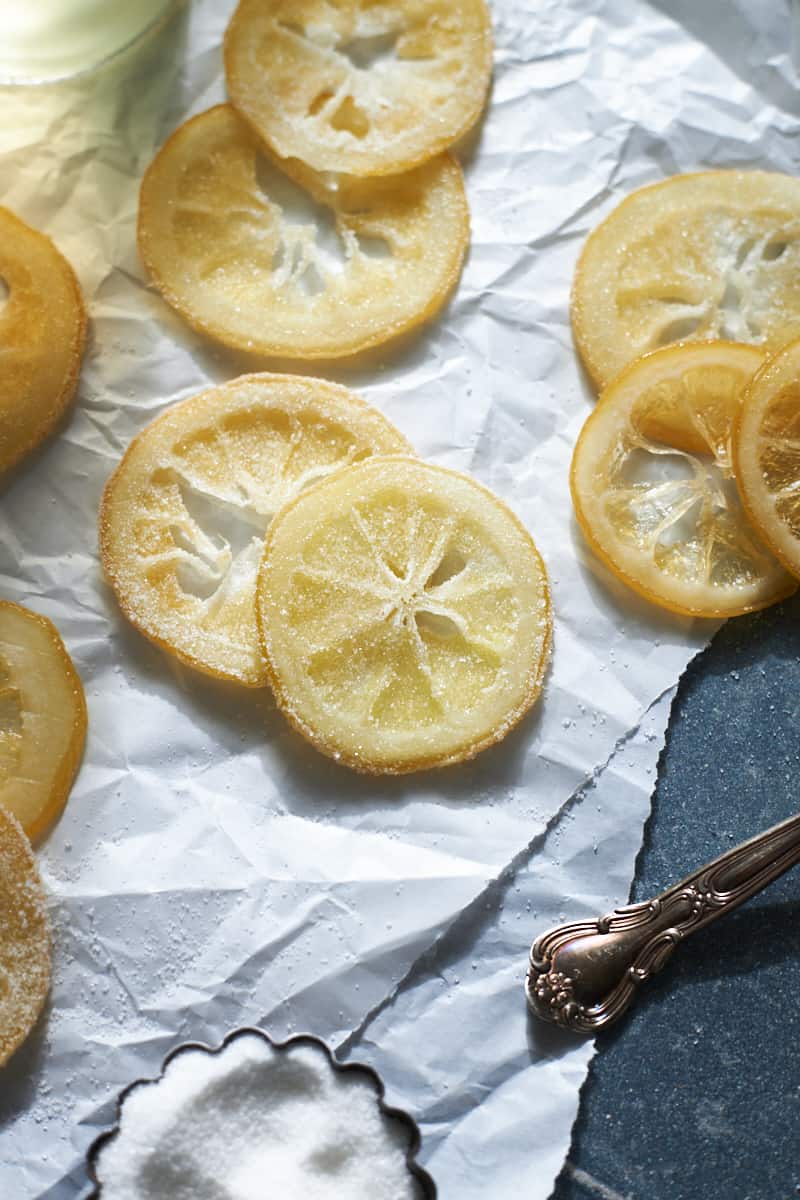 Candied Lemon Slices on white parchment paper. 