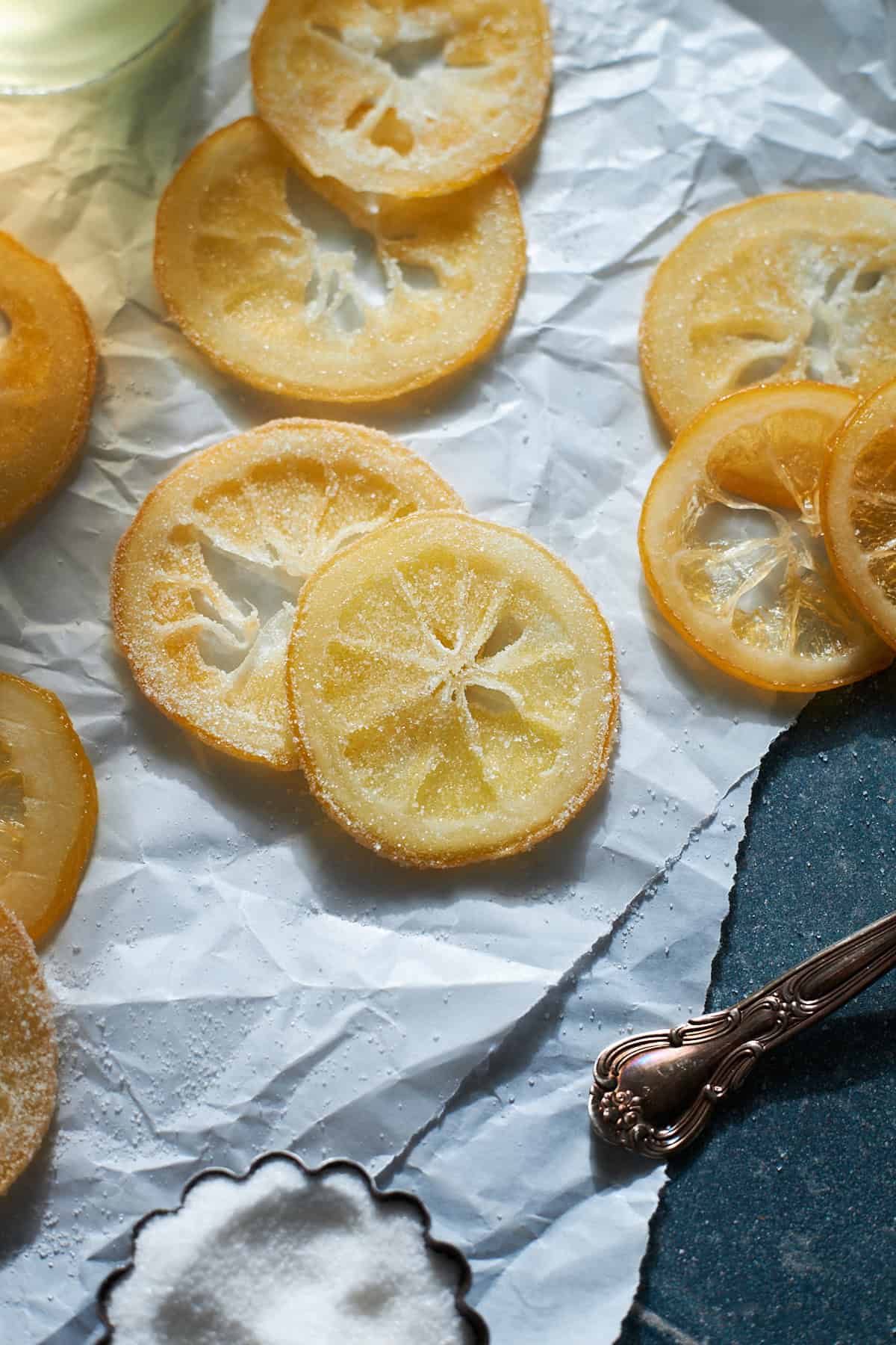 Candied Lemon Slices on white parchment paper. 