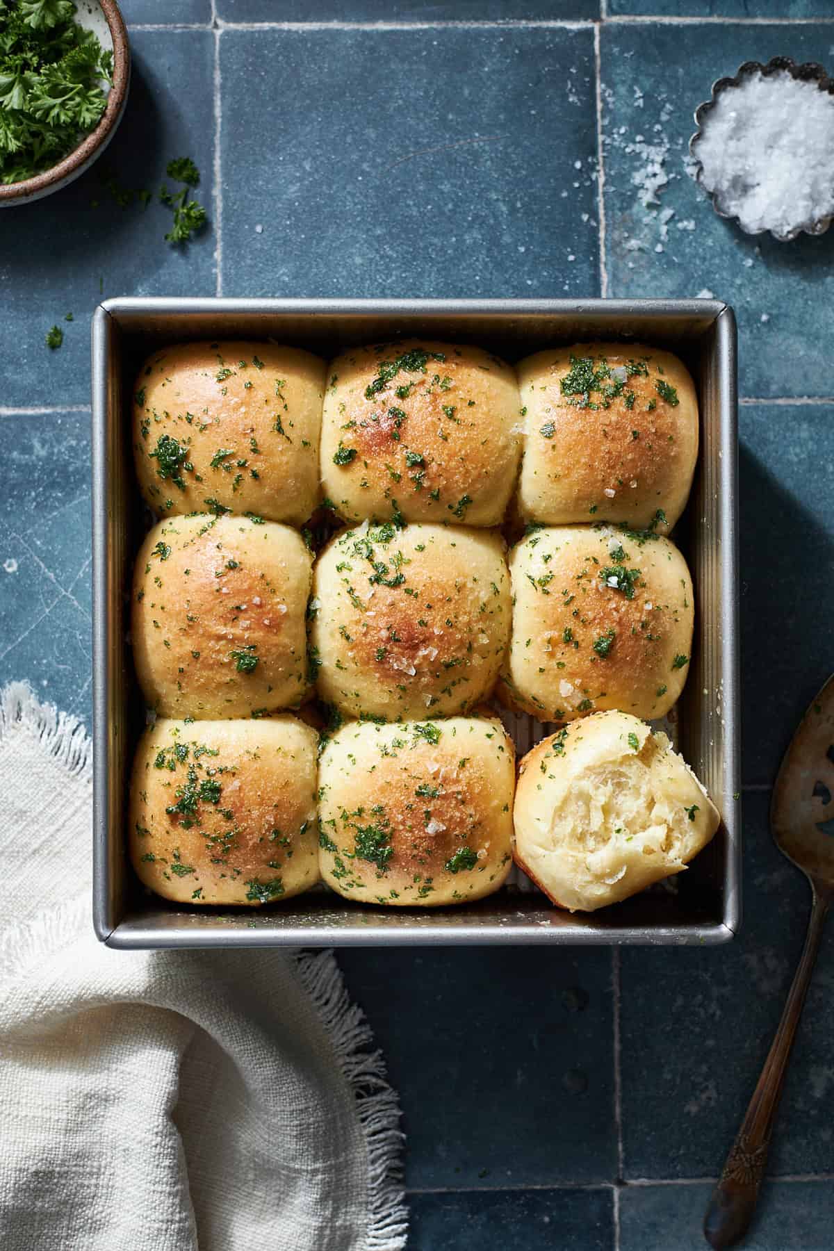 Sourdough Discard Garlic Rolls in a square baking pan.