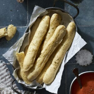 Sourdough discard breadsticks in a tray.