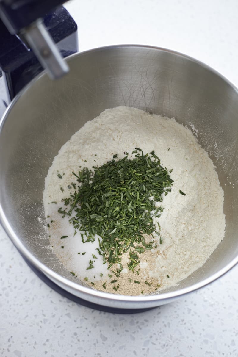 Dry ingredients in the bowl of a stand mixer.