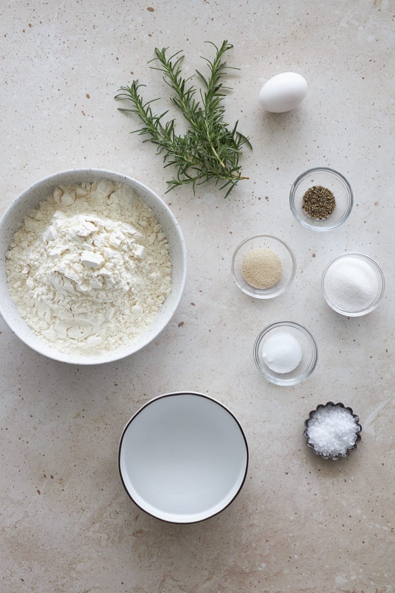 Ingredients for Rosemary Bagels in small bowls.